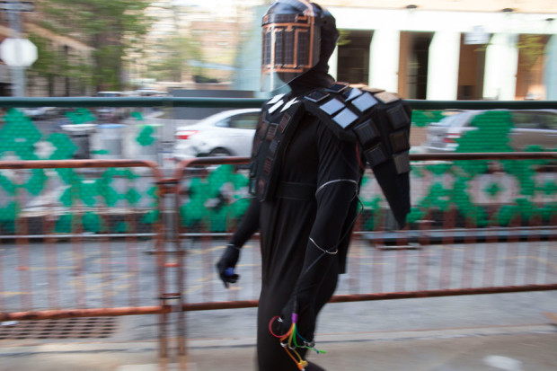 Edson, a former student, as Solar Power Man. He wears a superhero costume festooned with working solar cells. 