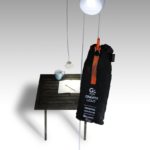 Gravity Light, and LED powered by slowly-descending weight.