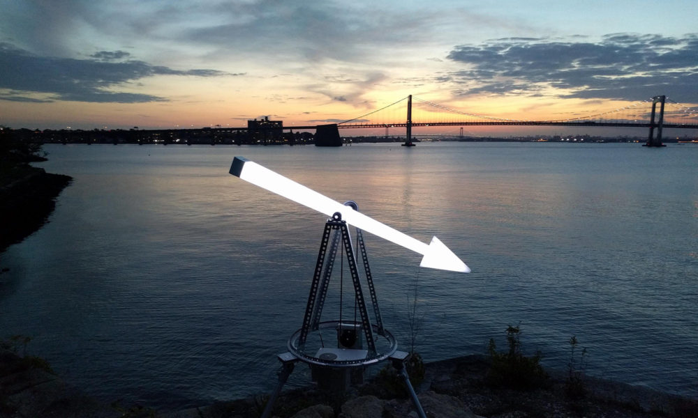 Heidi Neilson's Moon Arrow is a large mechanical sculpture of a glowing arrow that always points at the moon.