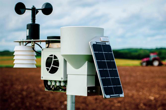 Voltaic hardware in the field - a solar panel, anemometer and other sensors mounted outside. 